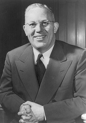 Justice Earl Warren, portrait, half figure, seated, facing front, as Governor.