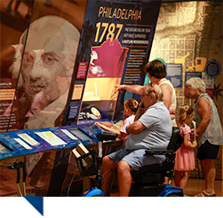 Visitors viewing an exhibit